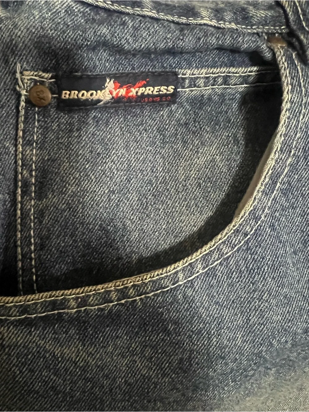 Men's Distressed Blue Jeans with Patch Detail